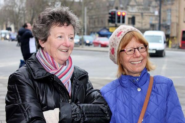 6 Merrill and Angie chat while waiting for the bus.jpg